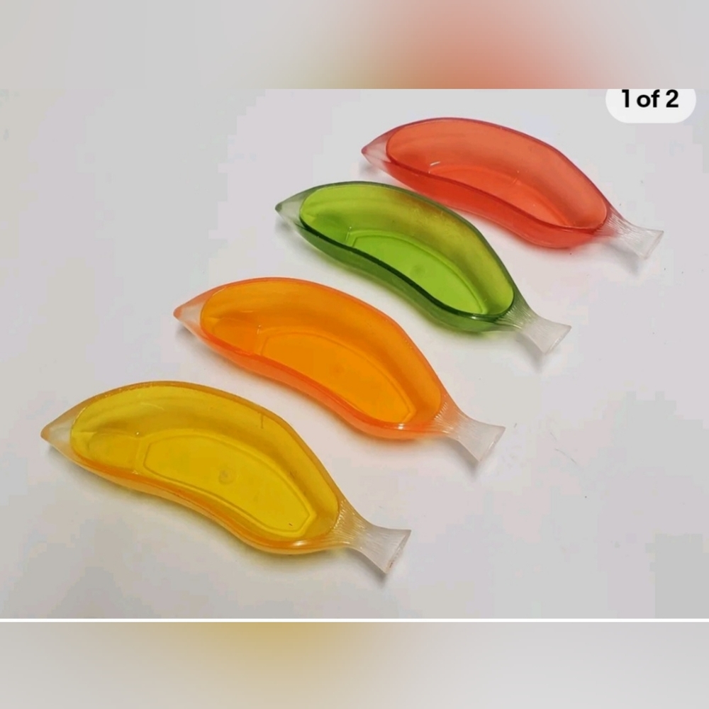 Pre-owned four-piece Banana Boat Banana Split Ice Cream Serving Bowls Set.